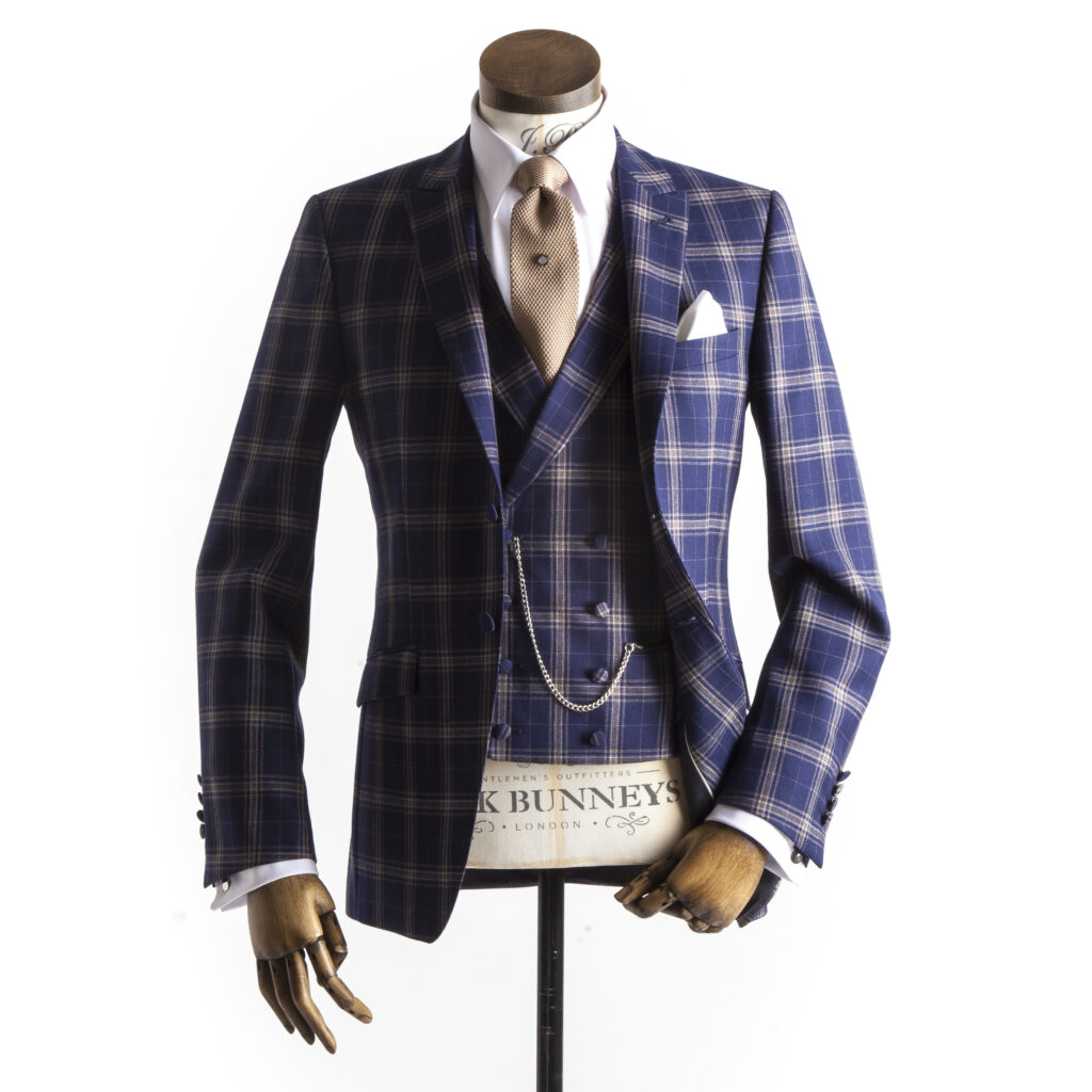 Bold Blue Check Wedding Suit with a gold tie