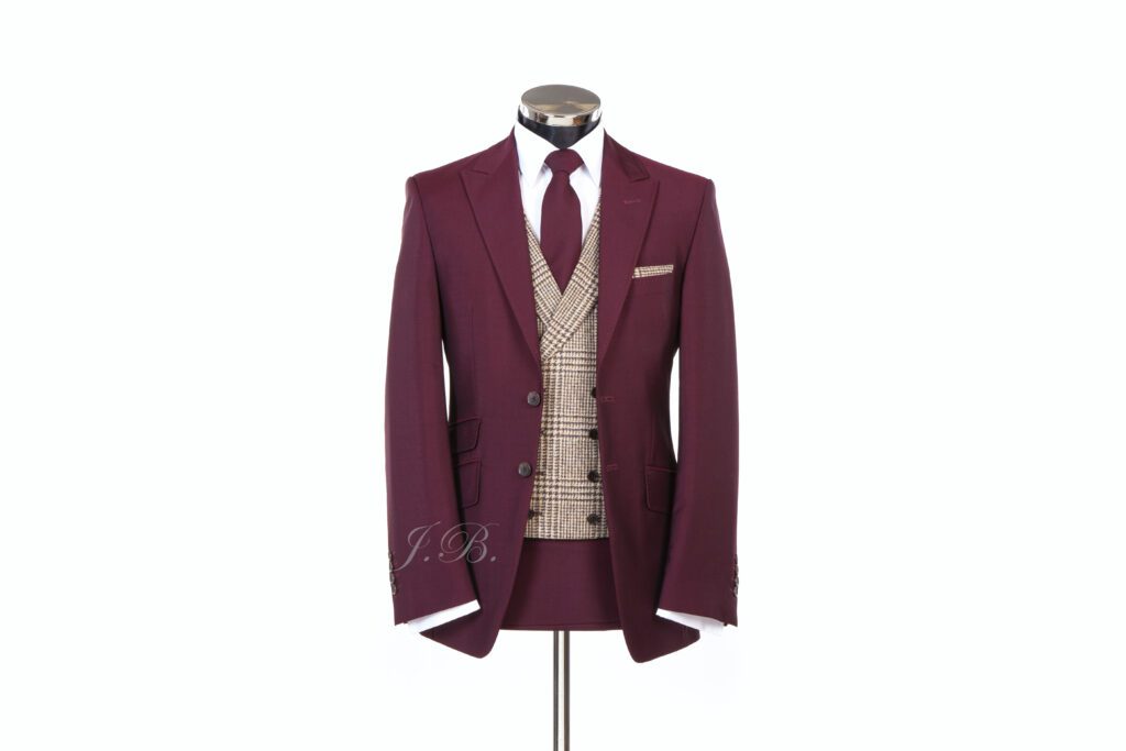 Burgundy red wedding suit with brown check waistcoat and red tie